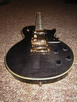 Jay Turser Black Beauty serpent inlay body.jpg